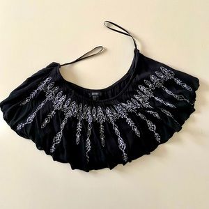 Elegant back crop top with beautiful floral embroidery. Gently worn.